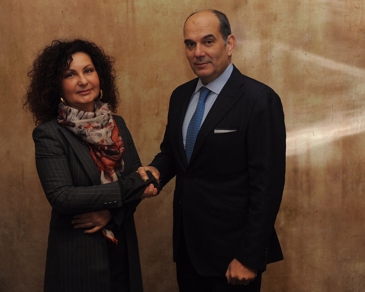 Here, Sonia Bonfiglioli poses with Enrico Carraro after O&K Antriebstechnik agreement.