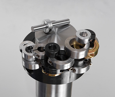 These are clamp-style shaft collars made by Ruland Manufacturing for solid holding. Suitable for medical equipment, the collars can guide, space, stop and align. Face-to-bore perpendicularity is a TIR less than or equal to 0.002 in., critical when the collar serves as a load-bearing face or aligns gears or bearings.